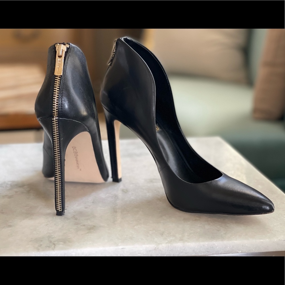 BCBG black heels with zipper detail along the back heel